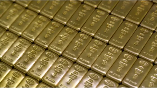 Vàng trồi sụt khi nỗi lo về Fed đẩy đồng USD tăng giá