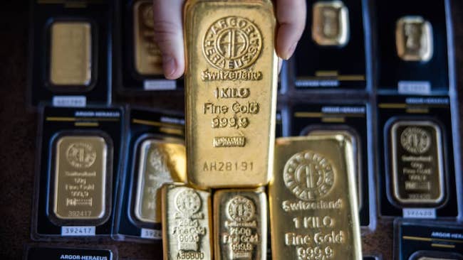 Vàng thế giới tăng nhẹ khi đồng USD suy yếu