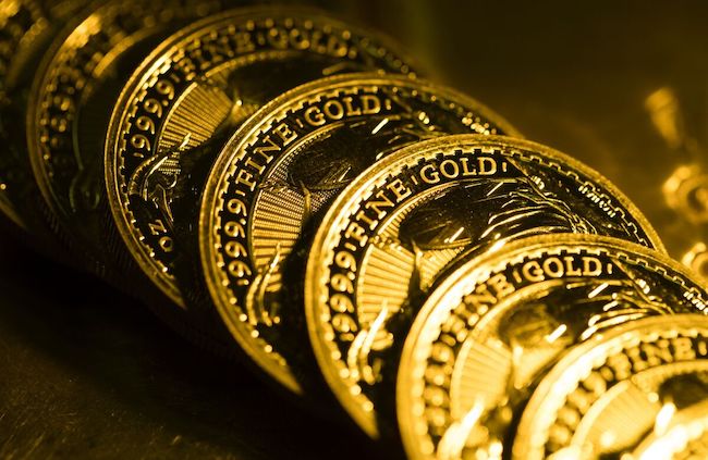 Vàng thế giới giảm gần 1% sau báo cáo việc làm của Mỹ