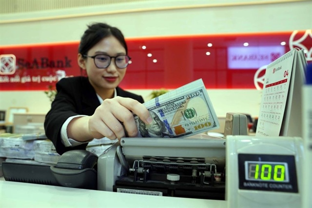 Vì sao Ngân hàng Nhà nước lại bán đô la Mỹ ở mức 26.000 đồng?